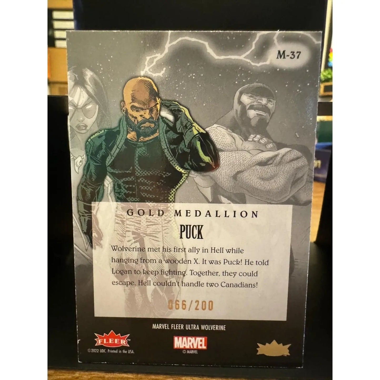 Fleer Ultra Wolverine GOLD MEDALLION Puck 66/200 - MOD Shop LLC