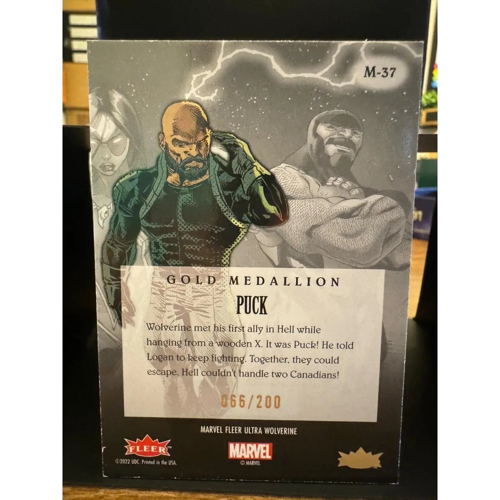 Fleer Ultra Wolverine GOLD MEDALLION Puck 66/200 - MOD Shop LLC
